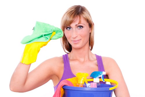 Professional carpet cleaner in Haringey working on a residential living room carpet