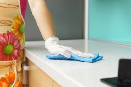 Local domestic cleaners in Haringey preparing a bedroom for cleaning